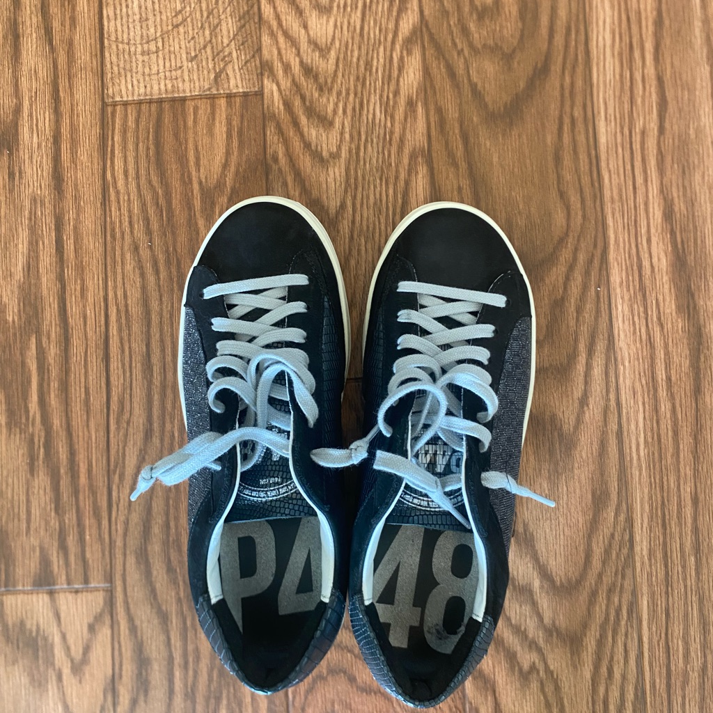 Woman’s Black And Gray Sneakers